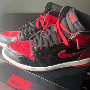 black and red jordan 1s